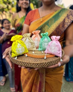 Elegant Pearl Embroidered Silk Potli Bags (set of 5)